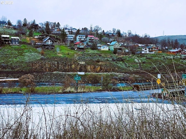 view of pool with a residential view