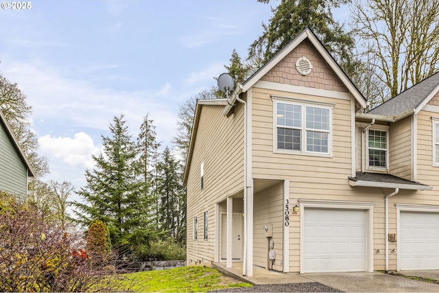 view of front of home featuring driveway and an attached garage