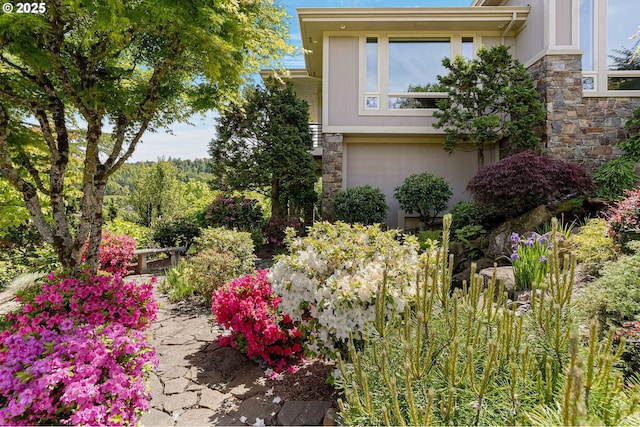 50 SE Avondale Ct, Gresham, OR 97080 - view of home's exterior featuring stone siding