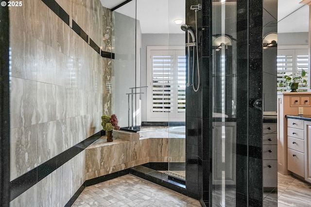50 SE Avondale Ct, Gresham, OR 97080 - full bath featuring a tile shower, tile walls, vanity, and plenty of natural light