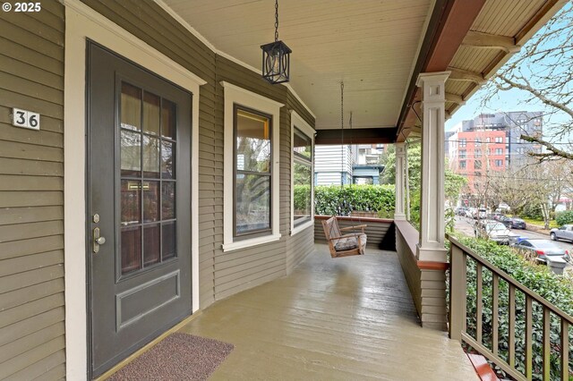 entrance to property with covered porch