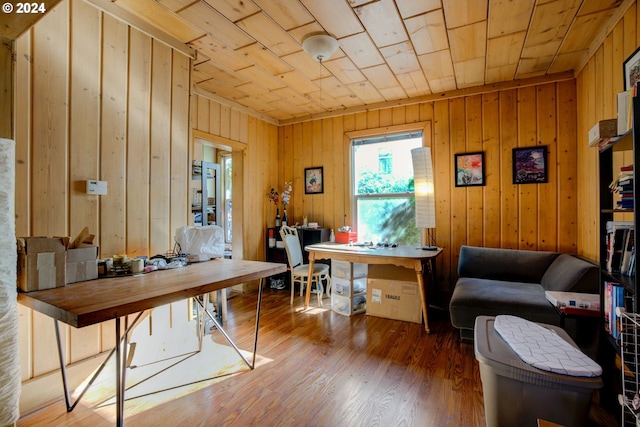 living room featuring light wood-style flooring and ornamental molding