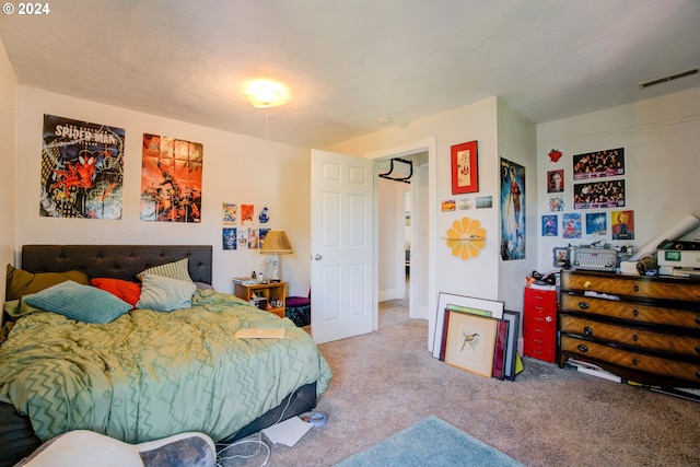 bedroom featuring carpet