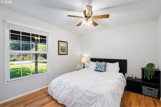 18344 Terry Ave, Lake Oswego, OR 97035 - bedroom featuring wood finished floors, baseboards, and ceiling fan