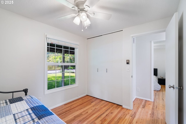 18344 Terry Ave, Lake Oswego, OR 97035 - bedroom featuring light wood-type flooring, baseboards, and a closet