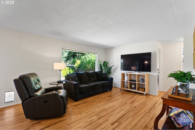 18344 Terry Ave, Lake Oswego, OR 97035 - living area with light wood finished floors and a textured ceiling