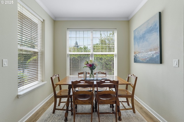 595 Springtree Ln, West Linn, OR 97068 - dining space with wood finished floors, plenty of natural light, ornamental molding, and baseboards