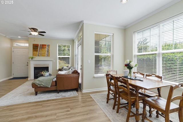 595 Springtree Ln, West Linn, OR 97068 - dining room with healthy amount of natural light, baseboards, light wood-type flooring, crown molding, and recessed lighting