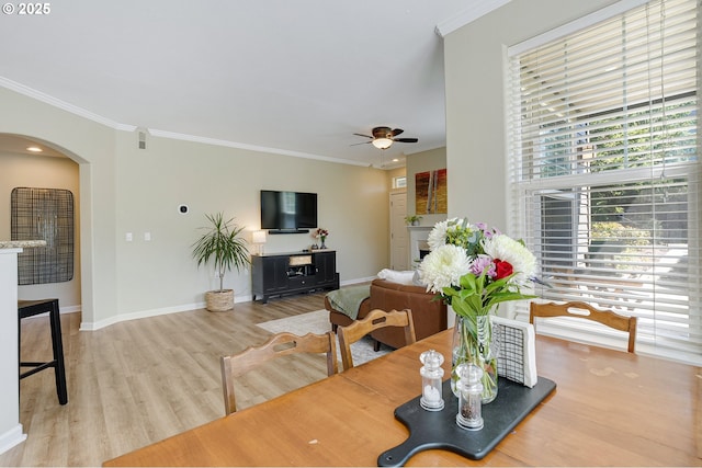 595 Springtree Ln, West Linn, OR 97068 - dining room with ceiling fan, ornamental molding, arched walkways, plenty of natural light, and baseboards