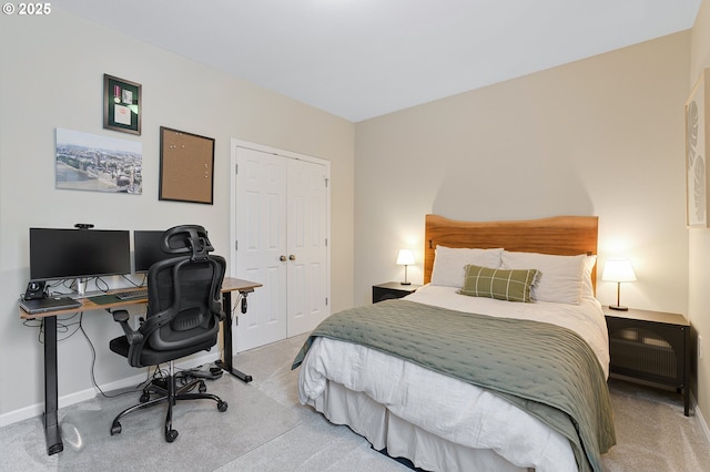 595 Springtree Ln, West Linn, OR 97068 - bedroom with light colored carpet, a closet, baseboards, and a desk