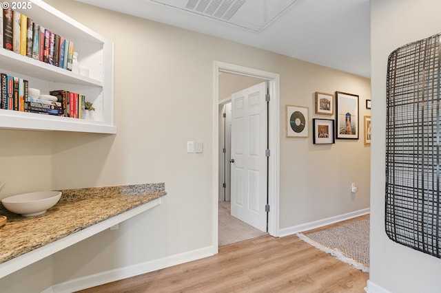 595 Springtree Ln, West Linn, OR 97068 - corridor featuring light wood-style flooring, baseboards, and attic access