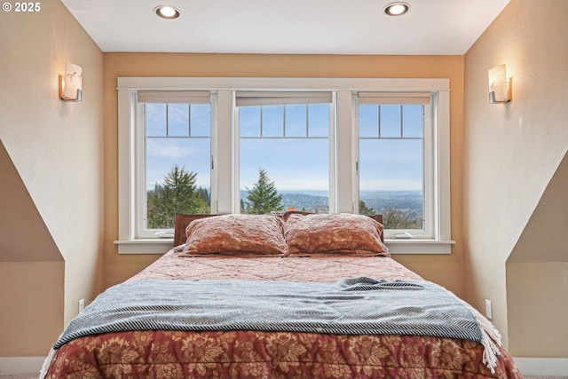 bedroom with recessed lighting