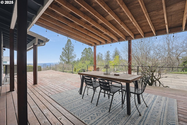 wooden deck featuring outdoor dining space