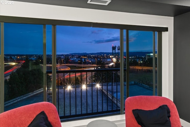 view of balcony at dusk