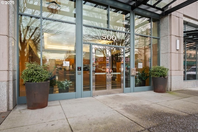 property entrance featuring french doors