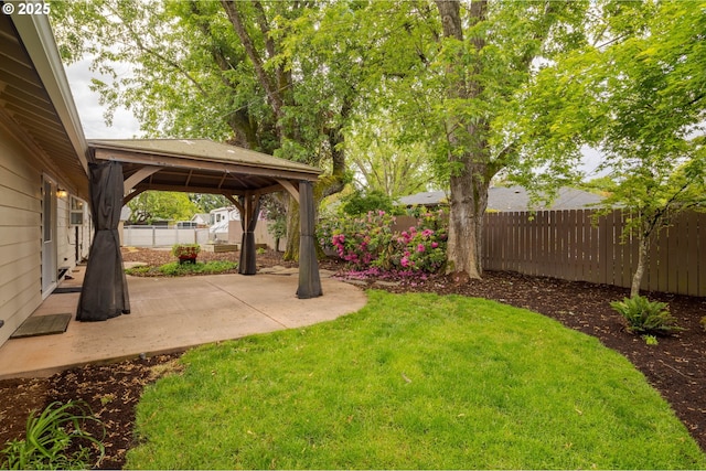 view of yard with a gazebo and a patio area