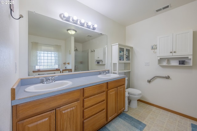 788 SE Meadows Loop, Sheridan, OR 97378 - full bath featuring double vanity, visible vents, a stall shower, and a sink