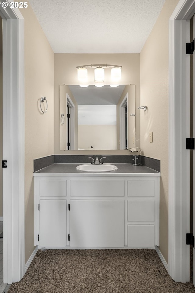 5877 NW 181st Ave, Portland, OR 97229 - bathroom with vanity and baseboards