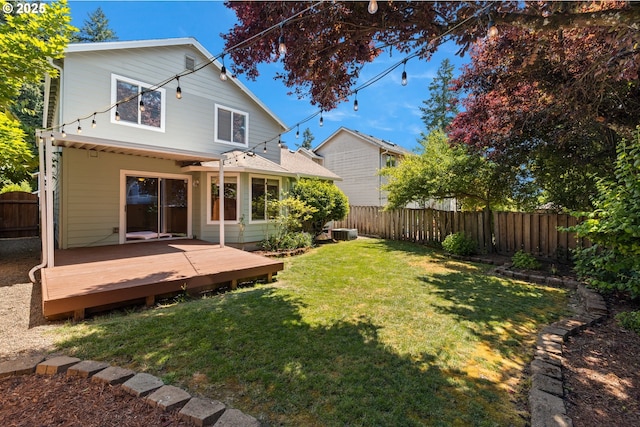 5877 NW 181st Ave, Portland, OR 97229 - back of property featuring a fenced backyard and a wooden deck