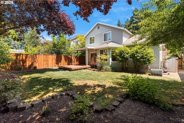 5877 NW 181st Ave, Portland, OR 97229 - view of front facade featuring a fenced backyard, a deck, and a shingled roof