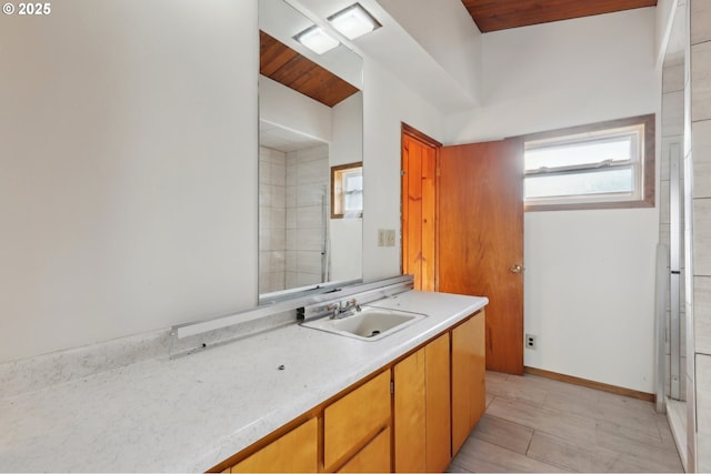 bathroom with vanity and tile patterned floors