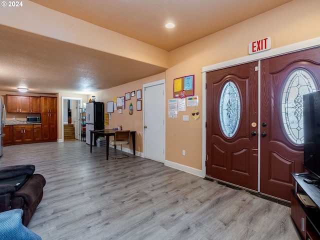 entryway featuring light wood-type flooring