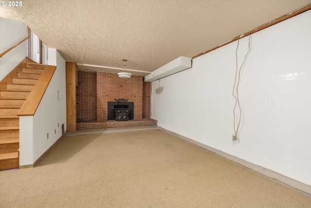 1220 NE 196th Ave, Portland, OR 97230 - unfurnished living room featuring a wood stove, carpet floors, a textured ceiling, and stairway