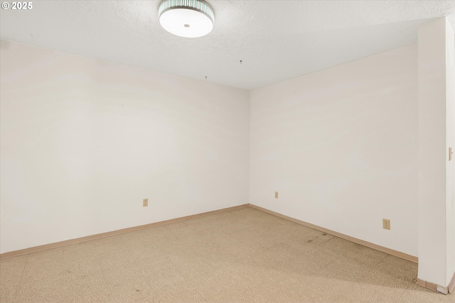 1220 NE 196th Ave, Portland, OR 97230 - unfurnished room featuring a textured ceiling and light carpet