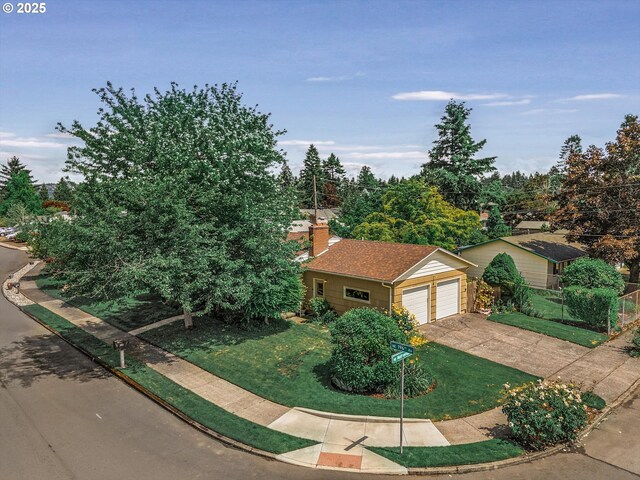 1220 NE 196th Ave, Portland, OR 97230 - view of front of property featuring a chimney, a detached garage, and concrete driveway