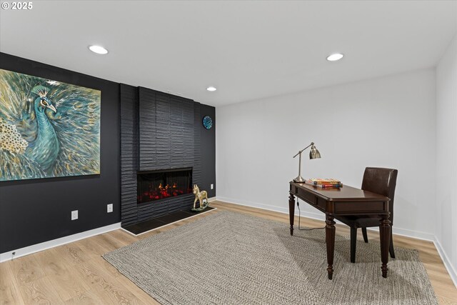 1801 NW Walmer Dr, Portland, OR 97229 - office area with a fireplace, wood finished floors, and recessed lighting
