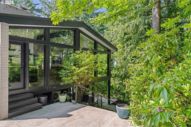 1801 NW Walmer Dr, Portland, OR 97229 - view of patio with a sunroom and entry steps