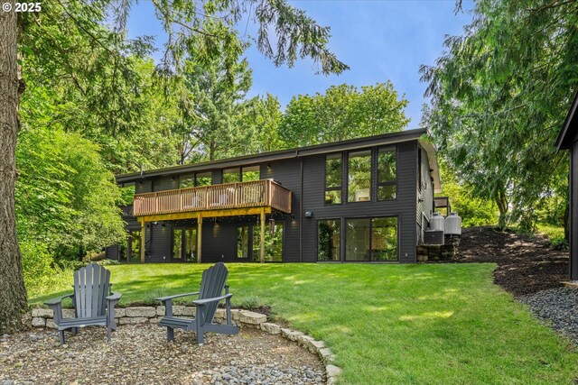 1801 NW Walmer Dr, Portland, OR 97229 - rear view of house featuring a deck and a yard