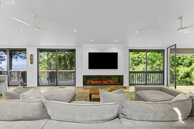 1801 NW Walmer Dr, Portland, OR 97229 - living area with a ceiling fan, a glass covered fireplace, recessed lighting, and wood finished floors