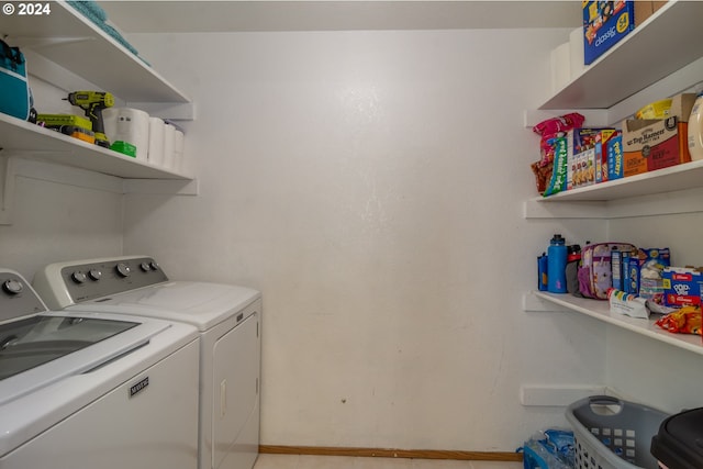 laundry room with washer and dryer