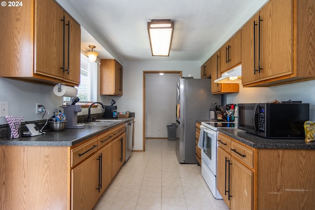 kitchen featuring sink and appliances with stainless steel finishes