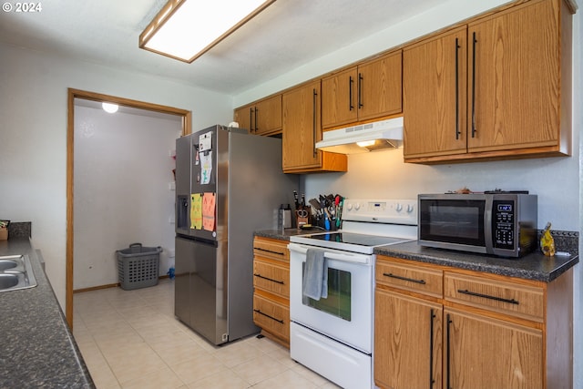 kitchen featuring stainless steel appliances and sink