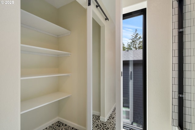 bathroom featuring baseboards
