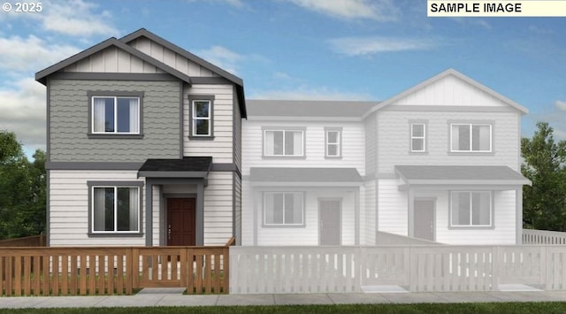 view of front of home featuring a fenced front yard and board and batten siding