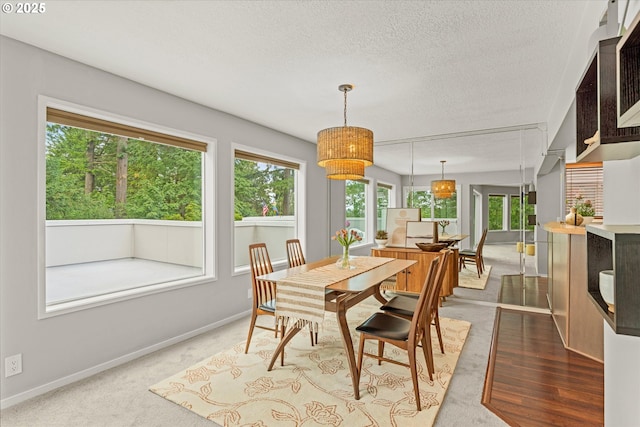 48 Eagle Crest Dr Unit 3D, Lake Oswego, OR 97035 - dining space featuring a textured ceiling and a chandelier