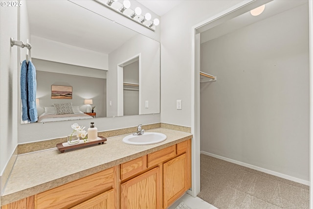 48 Eagle Crest Dr Unit 3D, Lake Oswego, OR 97035 - bathroom with vanity and a walk in closet