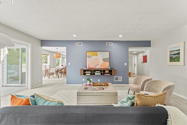 48 Eagle Crest Dr Unit 3D, Lake Oswego, OR 97035 - living room with carpet, a textured ceiling, and recessed lighting