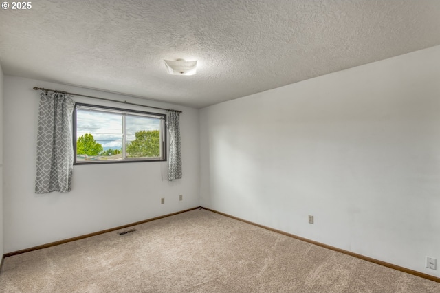 642 SW Cherry Park Rd, Troutdale, OR 97060 - spare room featuring carpet and a textured ceiling