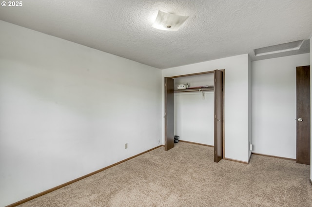 642 SW Cherry Park Rd, Troutdale, OR 97060 - unfurnished bedroom with light carpet, a textured ceiling, and a closet