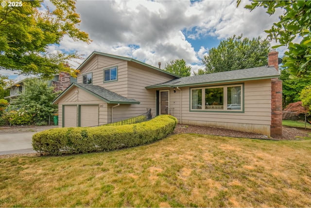 642 SW Cherry Park Rd, Troutdale, OR 97060 - tri-level home with a chimney, a front yard, driveway, and a shingled roof