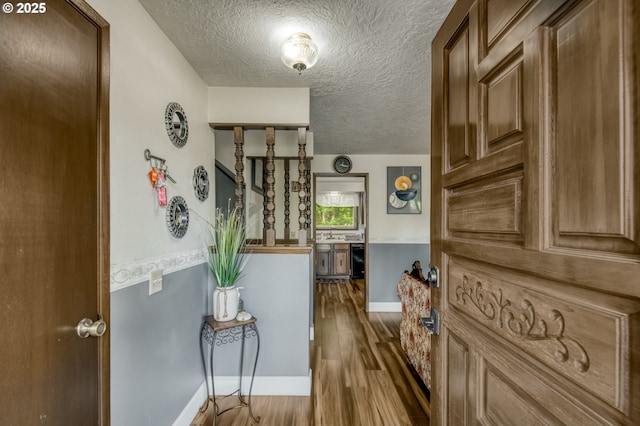 642 SW Cherry Park Rd, Troutdale, OR 97060 - hall with a textured ceiling and wood finished floors