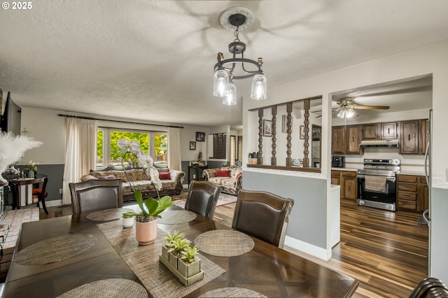 642 SW Cherry Park Rd, Troutdale, OR 97060 - dining area with dark wood finished floors, ceiling fan, and a textured ceiling