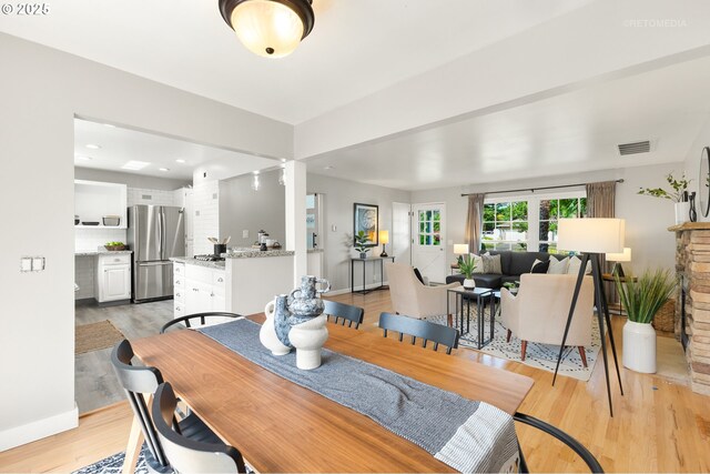 2338 NE 137th Ave, Portland, OR 97230 - dining space featuring light wood-style flooring