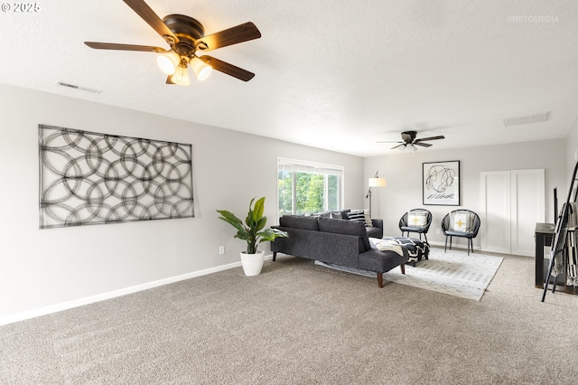 2338 NE 137th Ave, Portland, OR 97230 - carpeted living room with ceiling fan and a textured ceiling