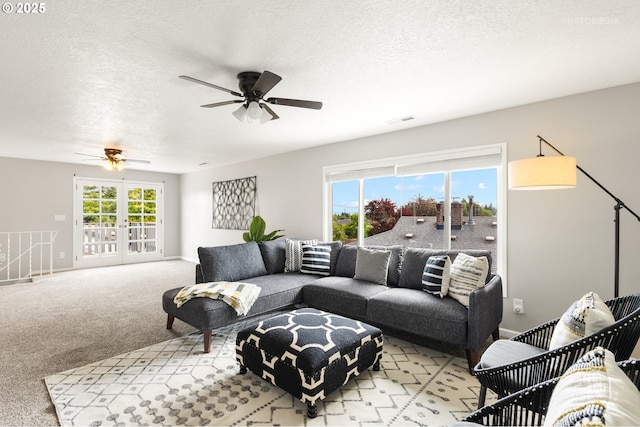 2338 NE 137th Ave, Portland, OR 97230 - living room with ceiling fan, light colored carpet, and a textured ceiling