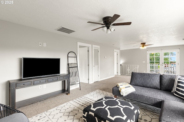 2338 NE 137th Ave, Portland, OR 97230 - living room featuring ceiling fan, a textured ceiling, and carpet floors
